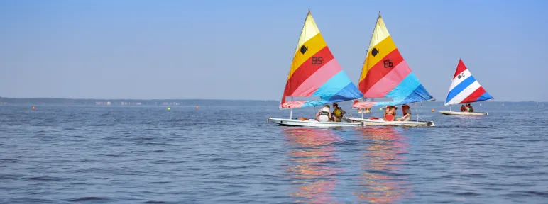 Three sail boats on the water