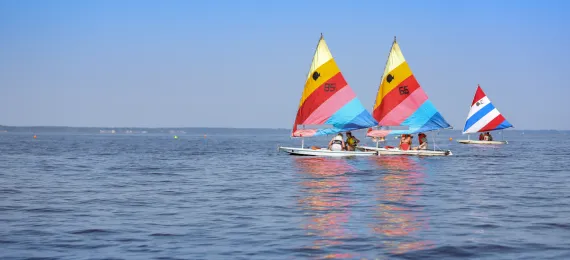 Three sail boats on the water